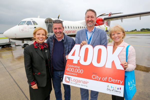 Eleanor and Gerry Loughlin who were awarded the tickets at City of Derry Airport.JPG